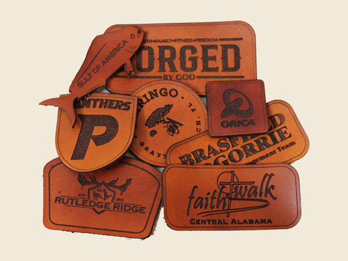Full-grain leather patches laser engraved with customer logos, cut in shield, circle, rectangle and custom shapes